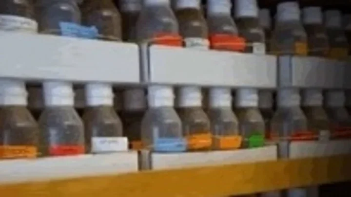 Lab bottles on shelf